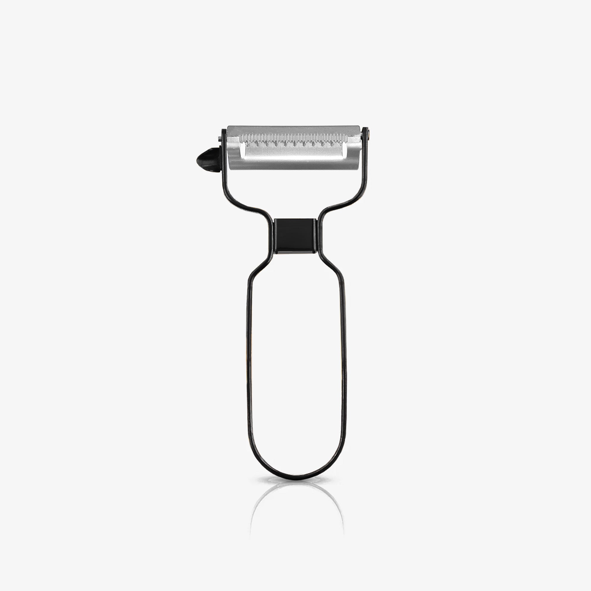 A black stainless steel julienne peeler standing upright on an off-white background, featuring a sleek metal handle and sharp serrated blade for creating thin vegetable strips.