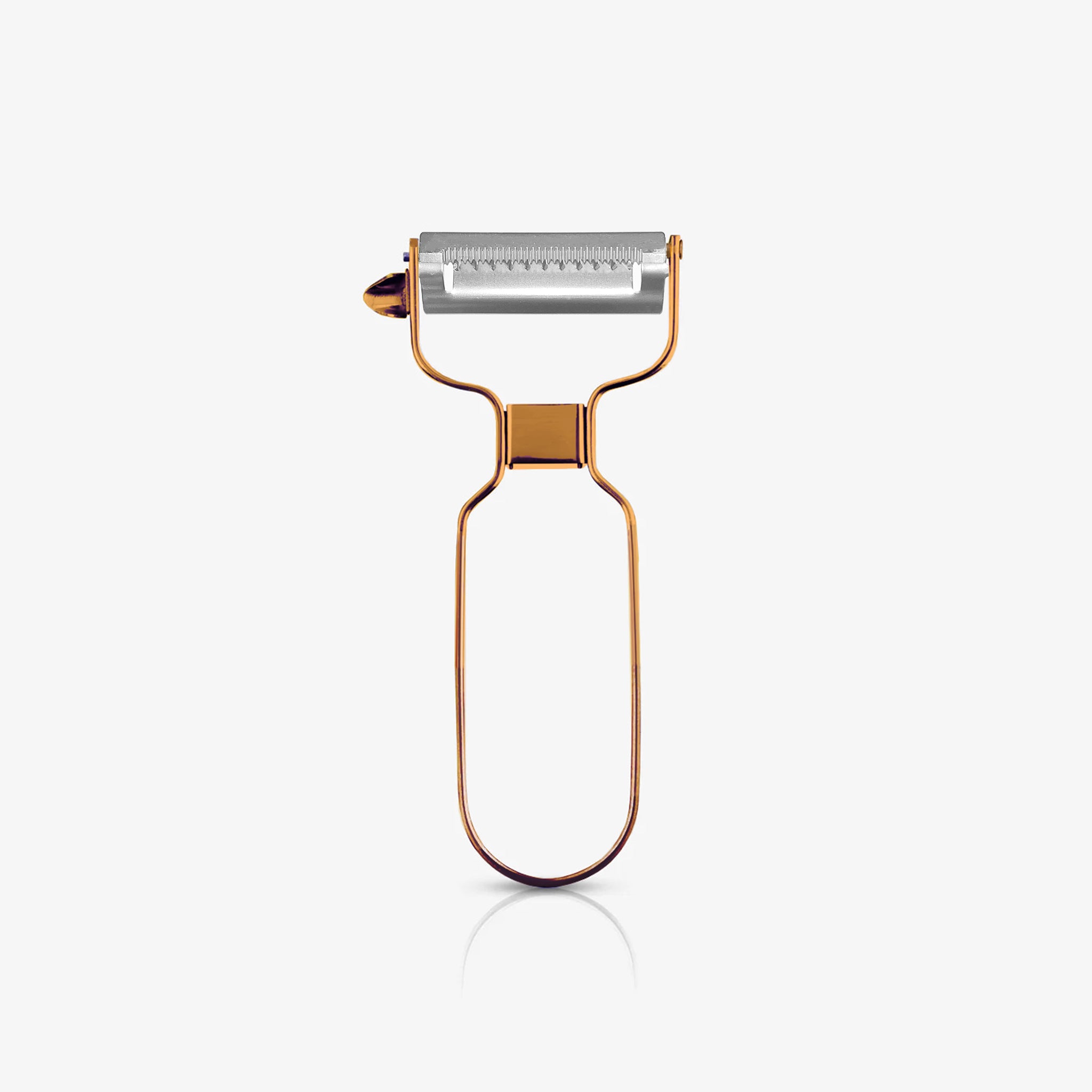 A copper stainless steel julienne peeler standing upright on an off-white background, featuring a sleek metal handle and sharp serrated blade for creating thin vegetable strips.